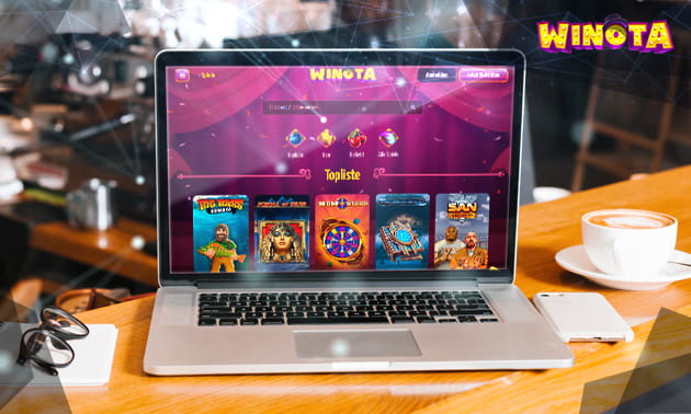 Die Webseite des Winota Casinos auf einem Laptop Bildschirm.